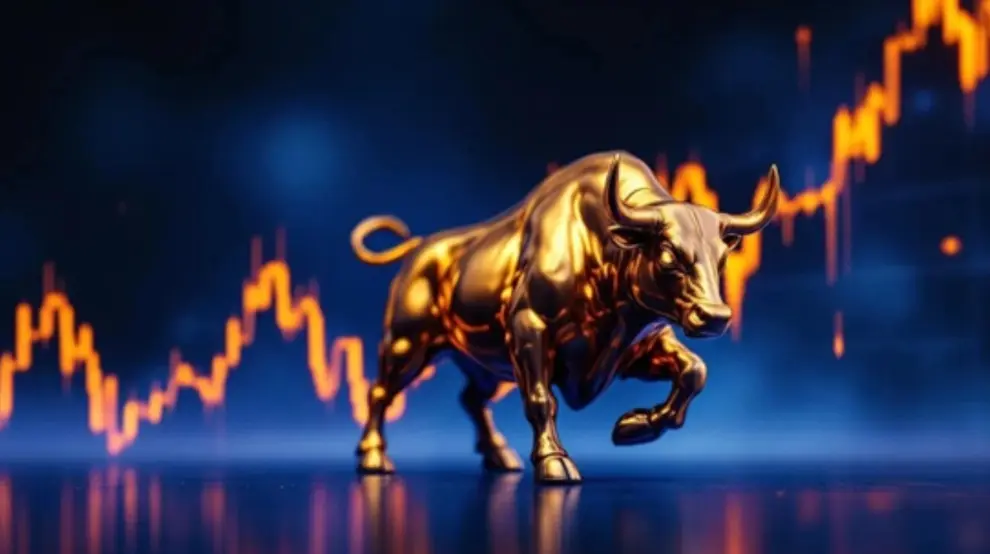 A FI golden bull statue with an upward financial chart in the background.